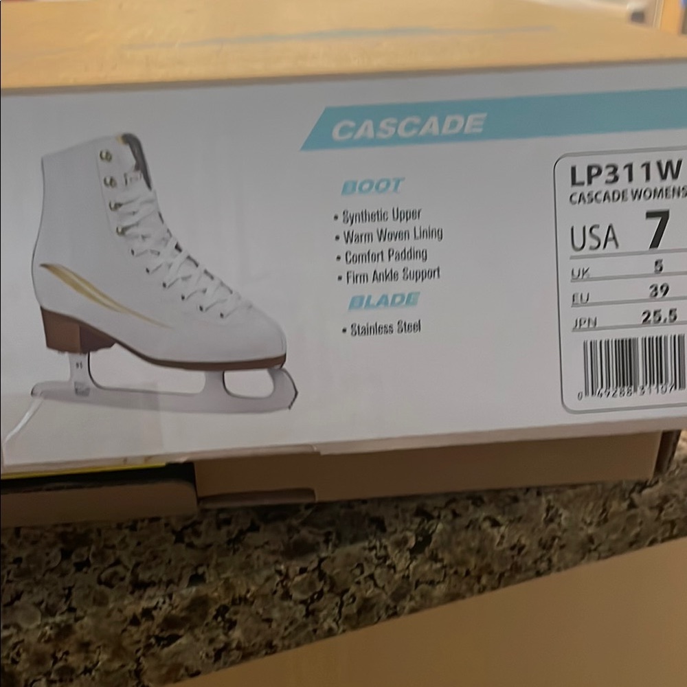 White and Gold Figure Skates with Classic Design